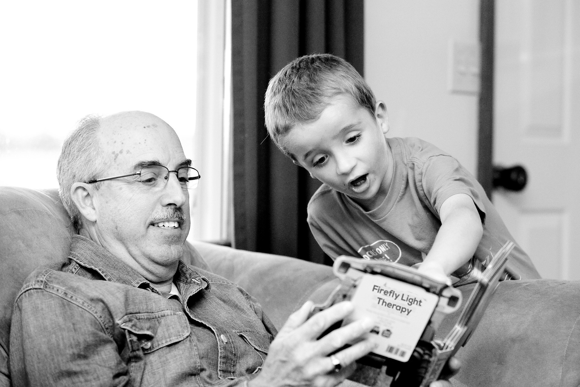 Reading about the safety of firefly light therapy for seniors and children