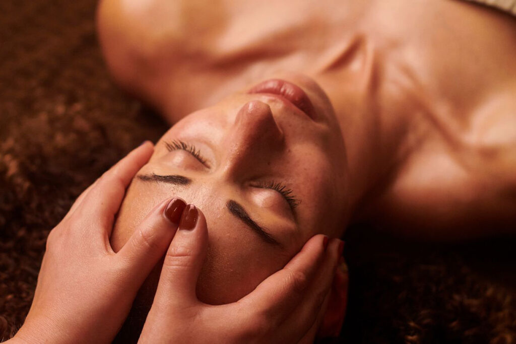 Headache relief massage focusing on neck, shoulders, jaw, and scalp tension