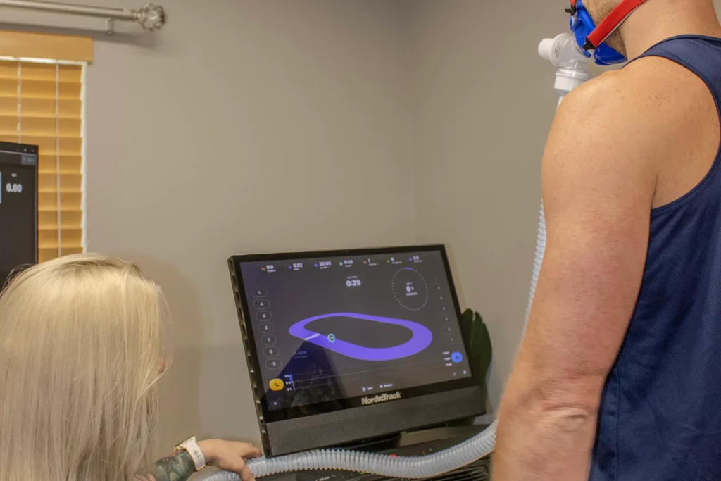metabolic testing treadmill with oxygen mask measuring energy output