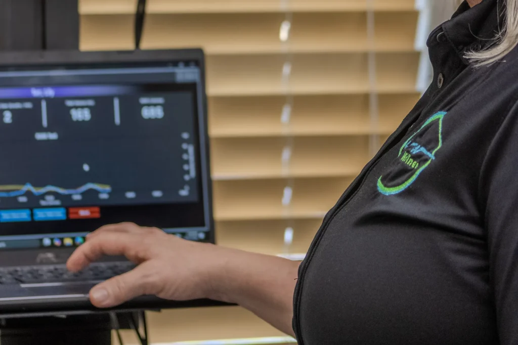Metabolic testing data being reviewed on a screen at Ideal Wellness in Juno Beach.