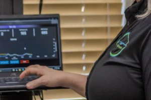 Metabolic testing data being reviewed on a screen at Ideal Wellness in Juno Beach.